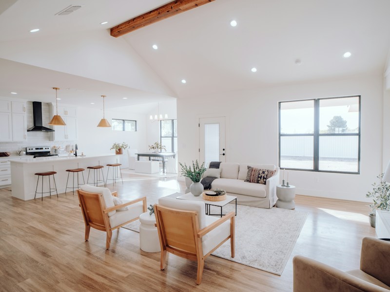 Bright modern rental property kitchen opening onto a garden
