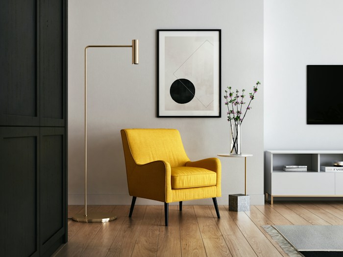 Well-presented rental property with a yellow armchair